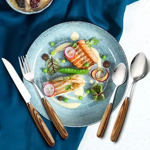 4-piece Stainless Steel Tableware Set with Portable Bag Wood Grain Handle Elegant Silverware Set Includes Knife Fork Spoon and Teaspoon Food Grade Material Ideal for Home Restaurant and Wedding Use Mirror Polished Surface Dishwasher Safe