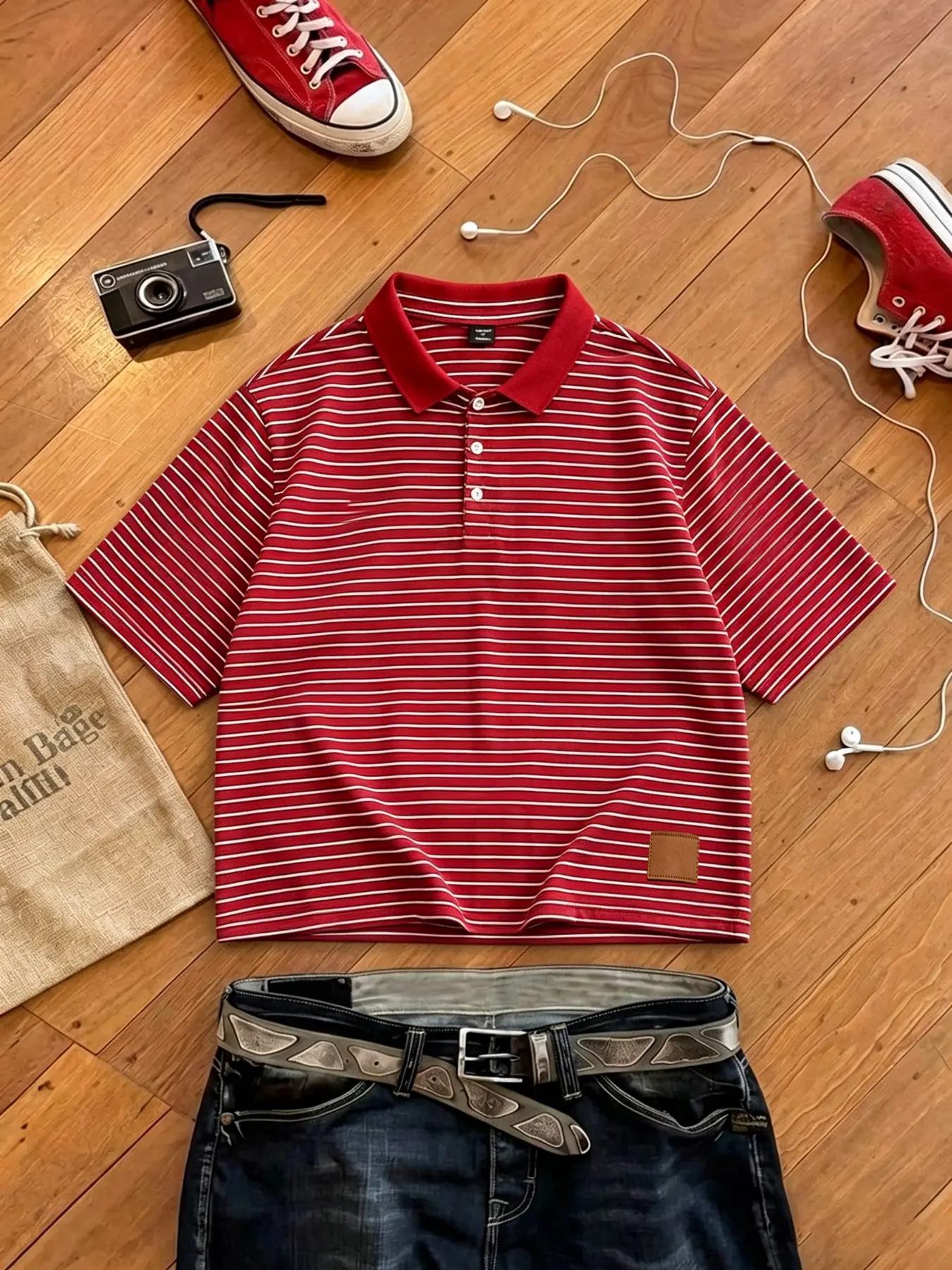 Men's polo shirt featuring a cotton fabric, red-and-white striped pattern, and a leather logo design; crafted from breathable, sweat-wicking material suitable for summer, with a relaxed, short-cut fit and a youthful, casual style Breathable polo shirts