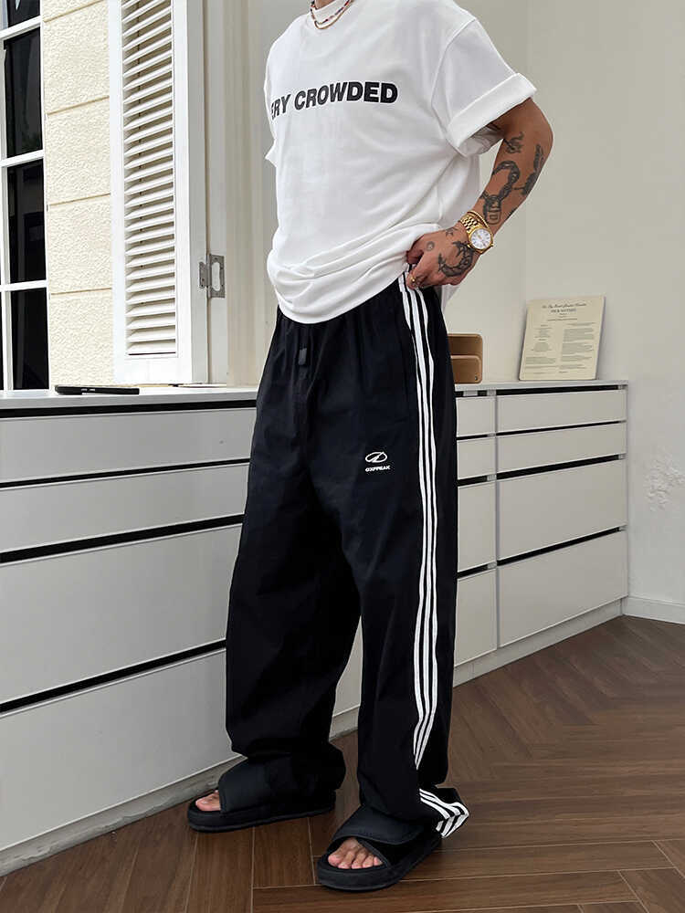 Men's vintage street-style quick-dry striped straight-leg casual pants, autumn trendy and versatile vibe loose sweatpants with a striped design aesthetic.