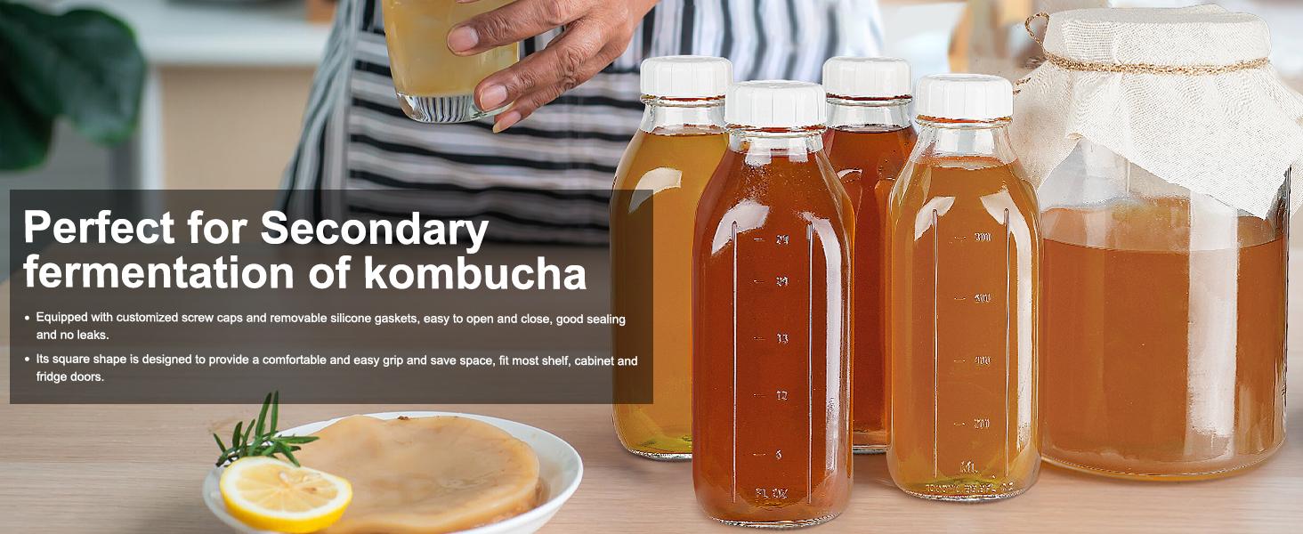 THE WELL KEPT 4 Pack 1 Liter (32 Oz) Glass Milk Bottles With Scale, 100% Airtight Heavy Duty Screw Lids, and 2 Pour Spouts-For Milk, Honey, Jam, Creamer-Dishwasher Safe (Extra 2 Lids Included) Silicone Beverage