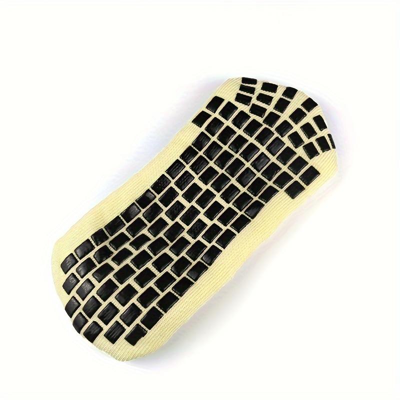 A Pair of Men'S Mid-Calf Football Socks, Designed with a Thick Towel Bottom for Enhanced Grip And Durability