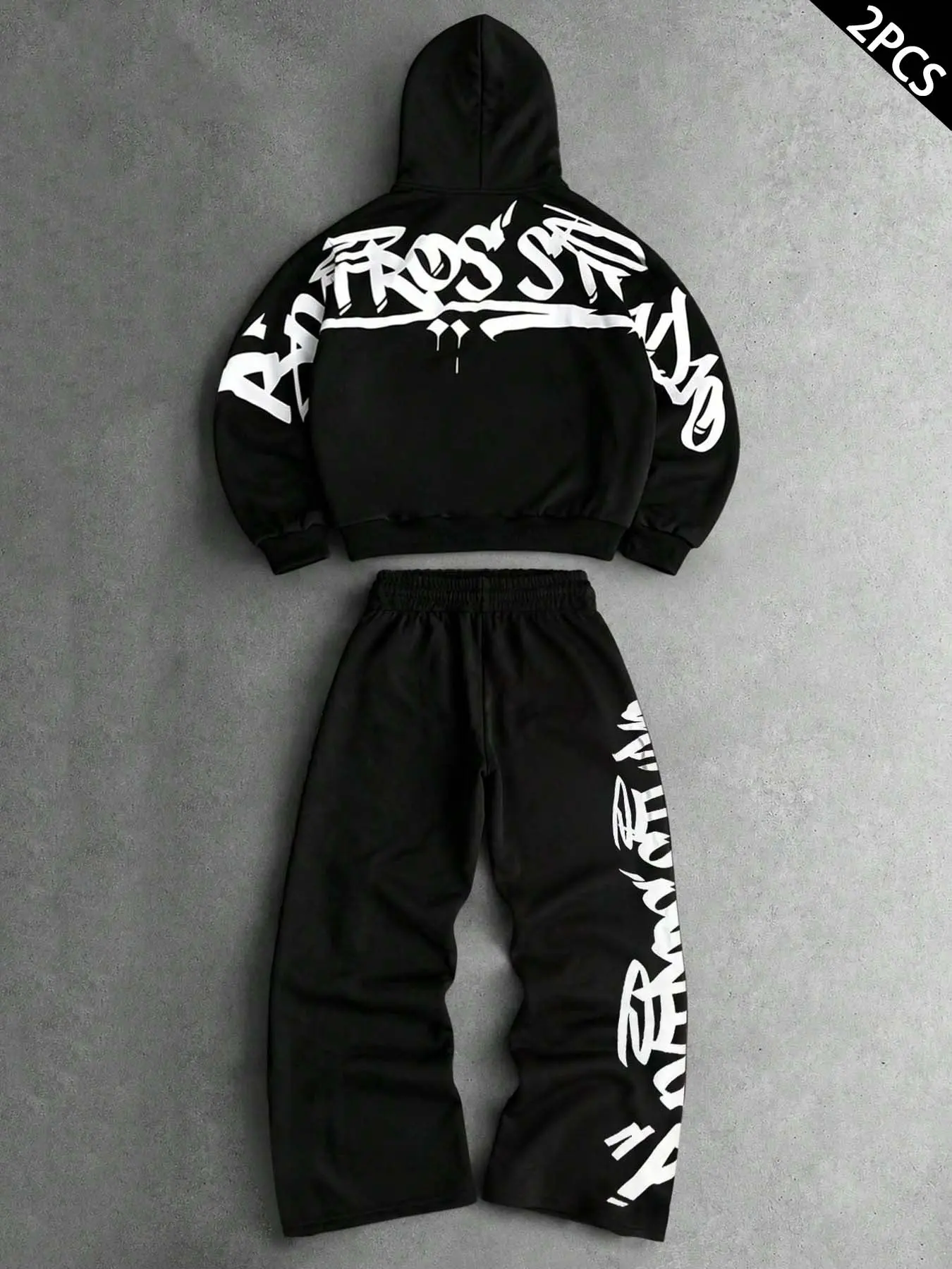 Black two-piece set, hoodie with graffiti letter print on the back & wide-leg jogger pants with side pattern, made of soft and comfortable fabric. Perfect for street style, skateboarding, concerts, campus hangouts, and weekend casual outings.