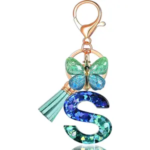 JINGUAZI Initial letter Keychains for Women Tassel Butterfly Pink Purple Cute Car Keychain for Wallet Backpack bag charm