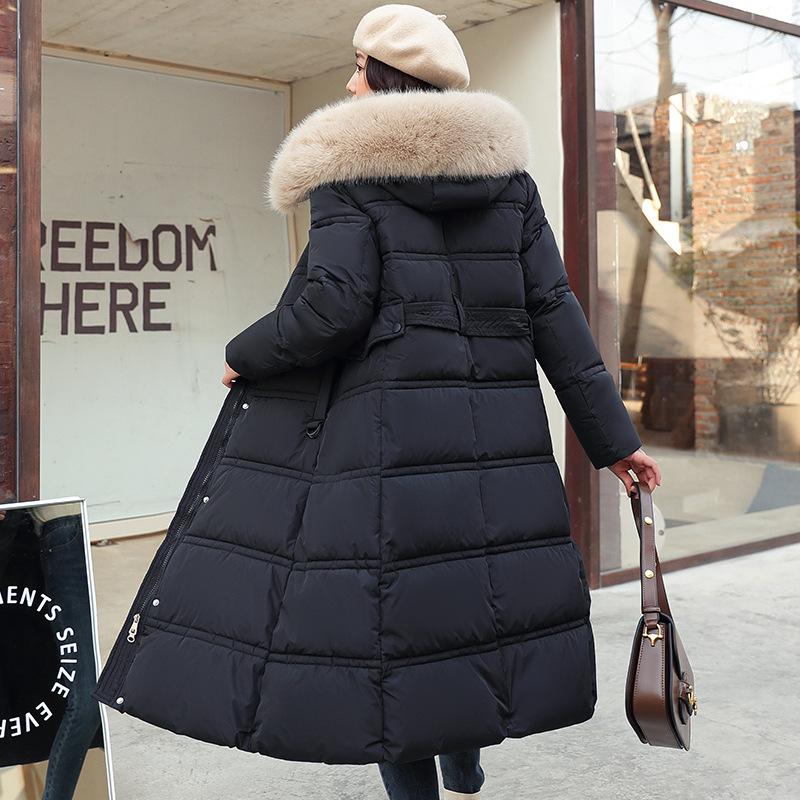 New winter women's thickened long over-the-knee hooded cotton-padded coat with large fur collar.
