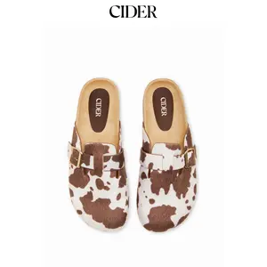 Cider COWHIDE PRINT FAUX SUEDE MULE FLATS