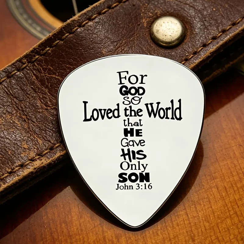 The stainless steel guitar pick, Acoustic guitar accessories, engraved with scriptures, with a rock atmosphere, is not only a professional pick, but also suitable as a baptism commemoration, a gift for players who love music, and a souvenir