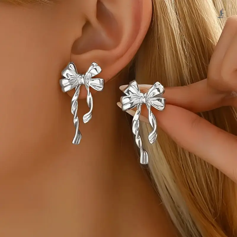 Women's Alloy Gold Bow Stud Earrings - Casual, Distinct Bow Silhouette, Exclusive Niche Designer Statement Jewelry, Smooth Polished, Lightweight Ear Accessories for Friends’ Daily or Party Outfits, Sisters, Dating, Delivers Effortless Stylish Charm, Exclu