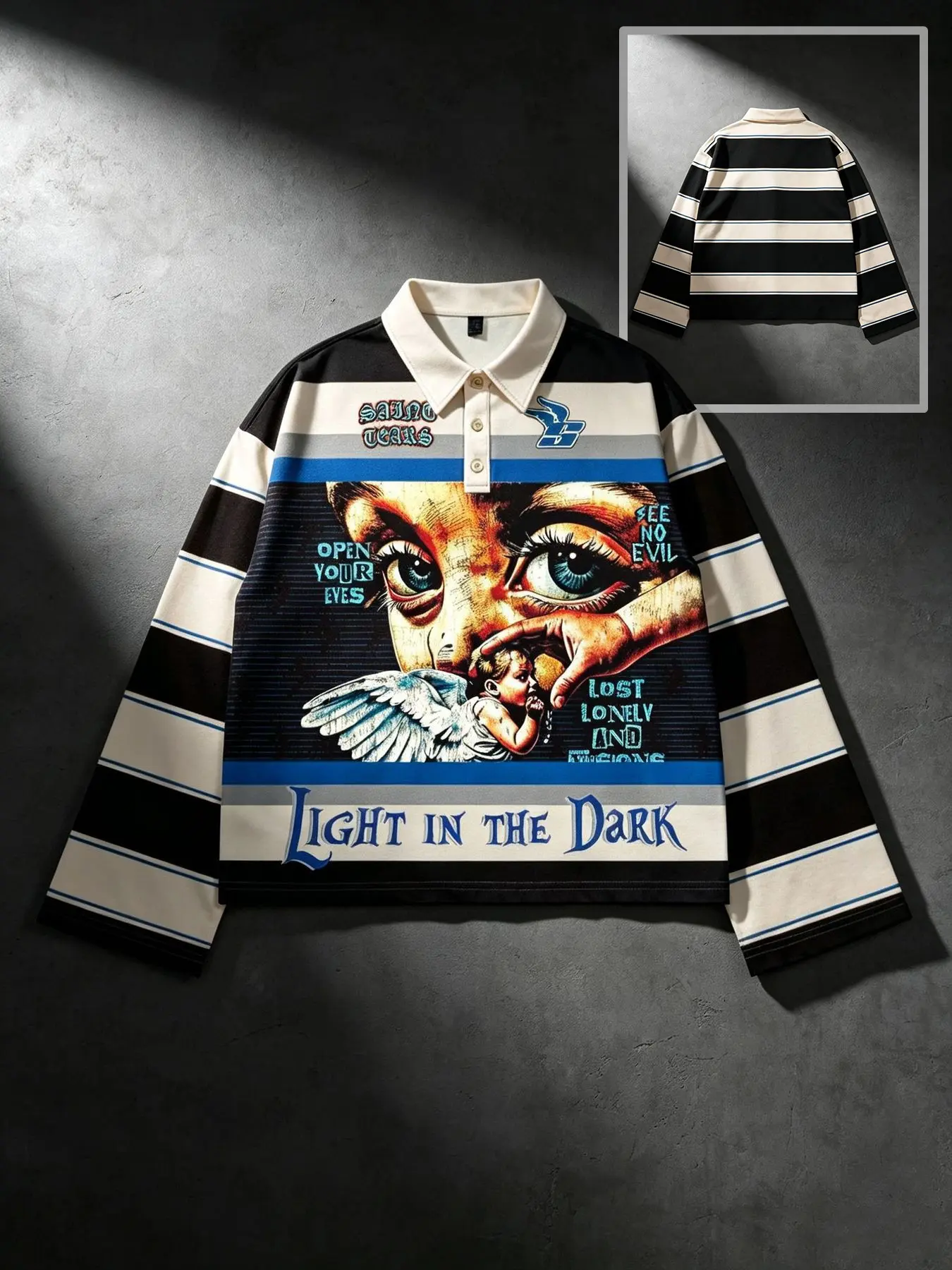 Black, apricot, and blue color-blocked striped long-sleeved polo shirt with a big-eyed angel logo and small English slogan print. This loose-fitting, short-sleeved casual men's shirt with a turn-down collar is unisex and suitable for everyday street style