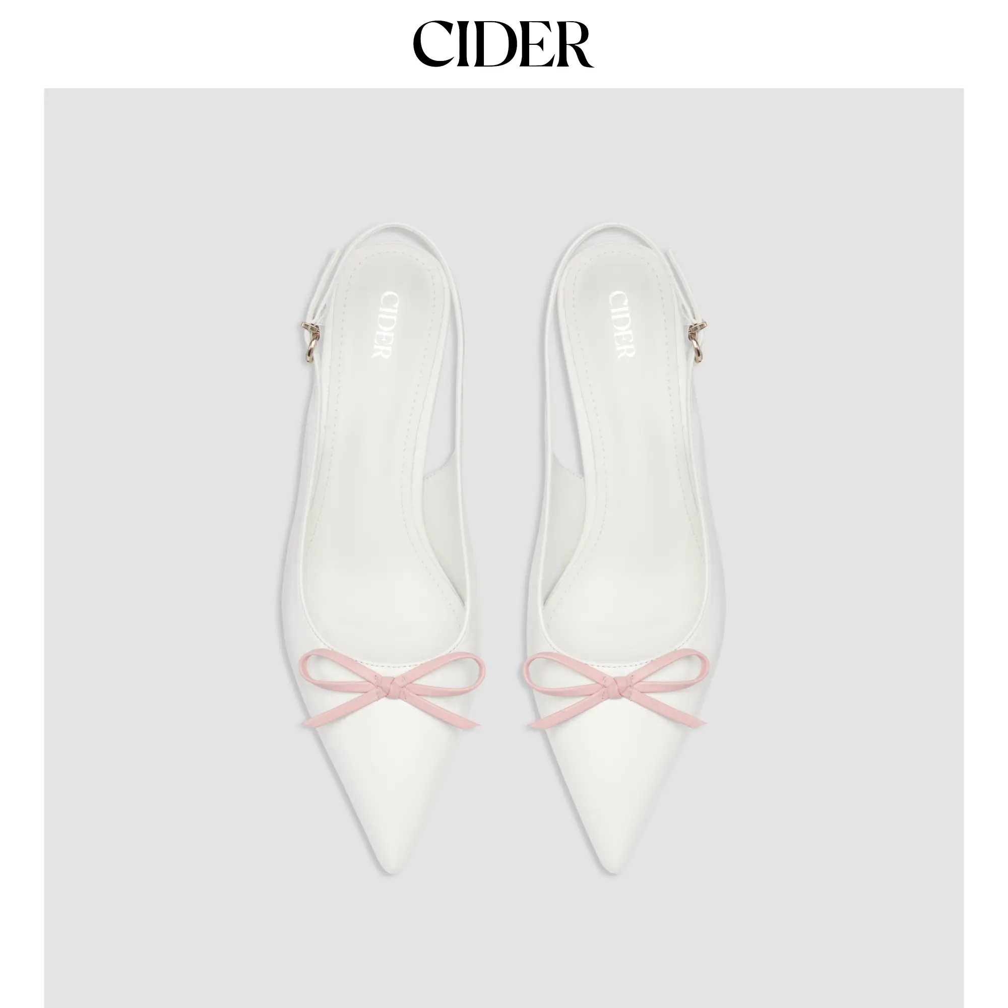 Cider TWO-TONE BOW POINTED-TOE SLINGBACK FAUX LEATHER KITTEN HEELS