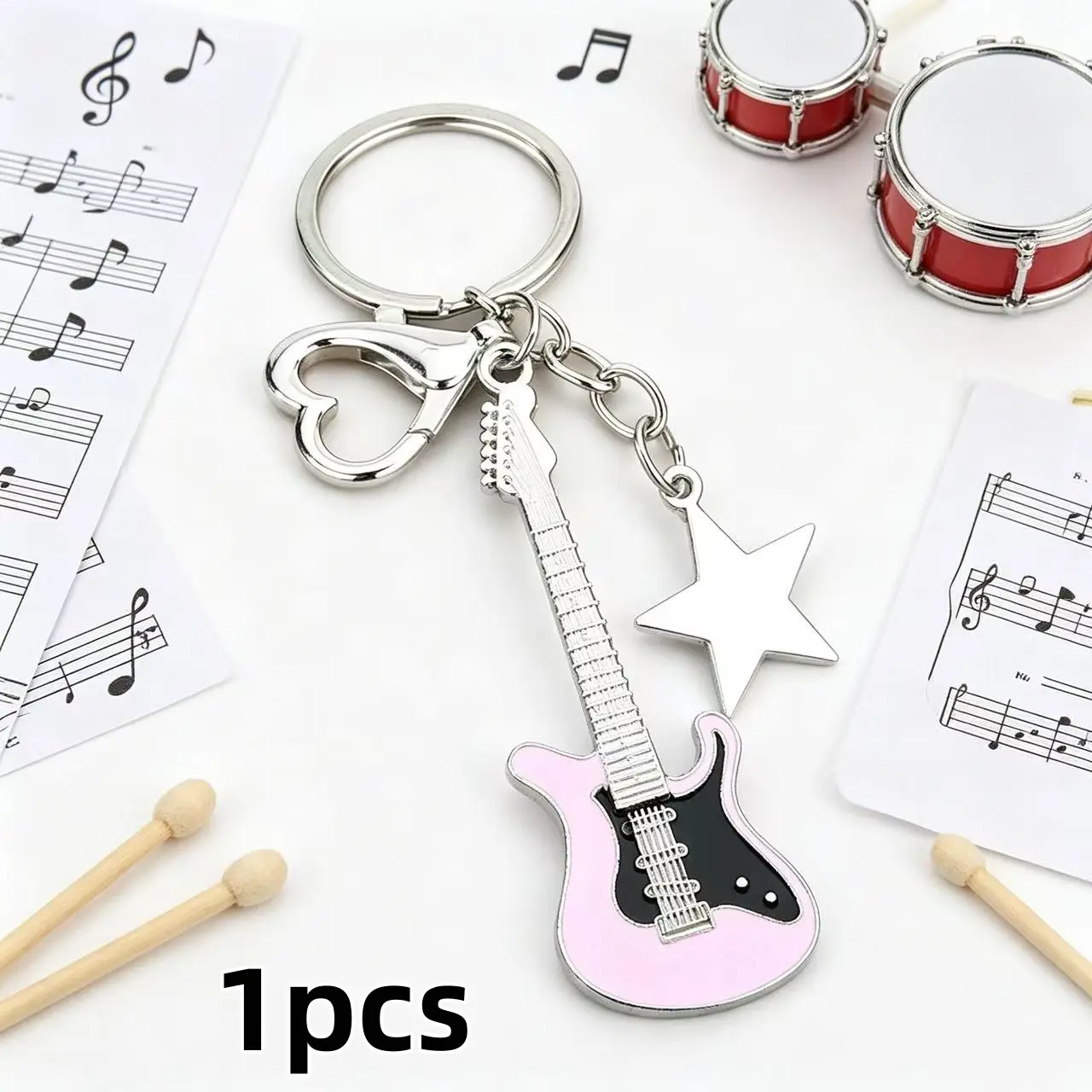 1 piece creative mini electric guitar star-shaped keychain pendant - perfect for commuting, a gift for music lovers, an activity gift for friends, a bag keychain decoration, a gift for a close friend.