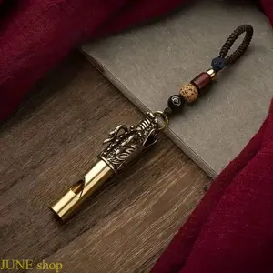 Durable Brass Survival Whistle With Compact Structure And Attached Cord, Crafted With Traditional Chinese Cultural Patterns, Multipurpose Portable Accessory For Emergency Outdoor Signaling, Keychain And Lanyard Attachment, Decorative Pendant Daily Use