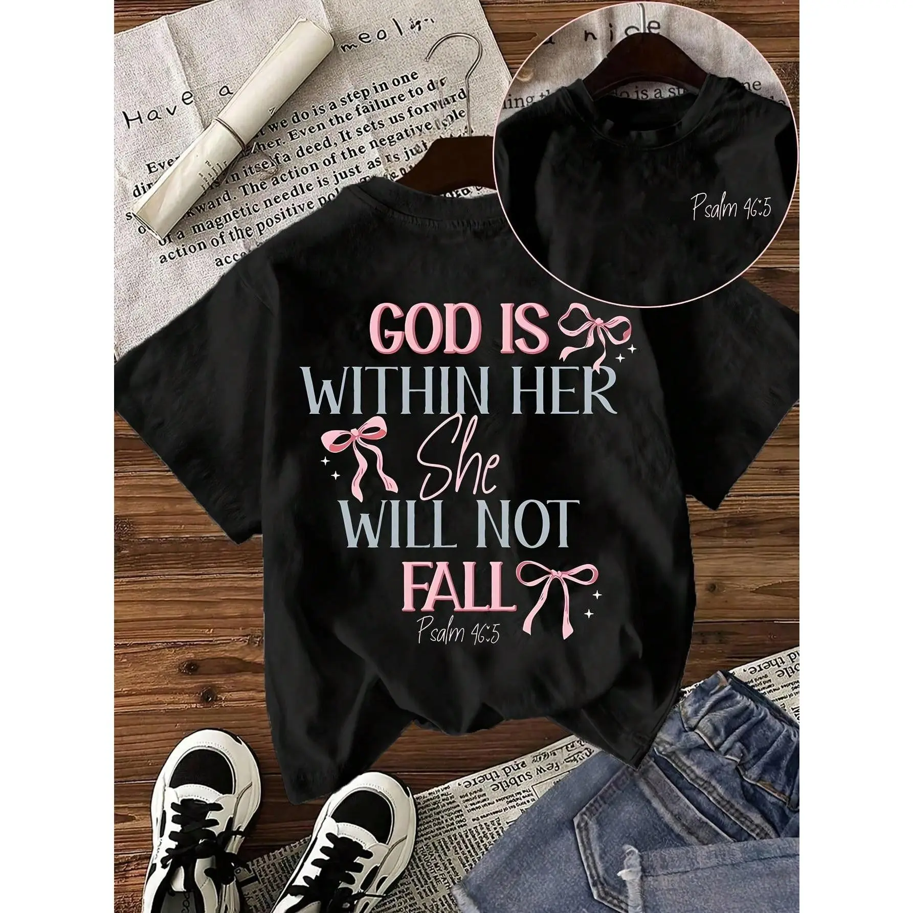 Women's Christian Bible Verse T-Shirt 'God Is Good In Her, She Shall Not Die' - Psalm 46:5, Pink And Blue On Black, Casual Short-Sleeved Crew Neck Top With Pink Bow Decoration - Faith Clothing, For Church, Bible Study, Daily Wear