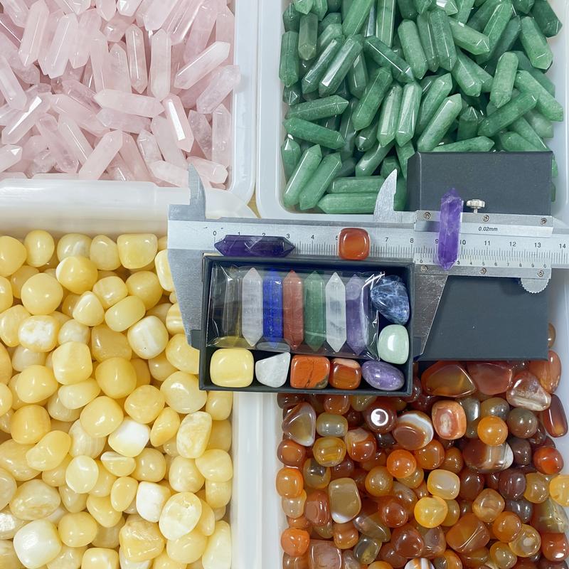 A set of double-pointed quartz crystals in a box, featuring natural stones for all seven chakras, hexagonal rose quartz ideal for bedroom decor, artificial artificial crystal included, presented in a uniquely designed gift box.