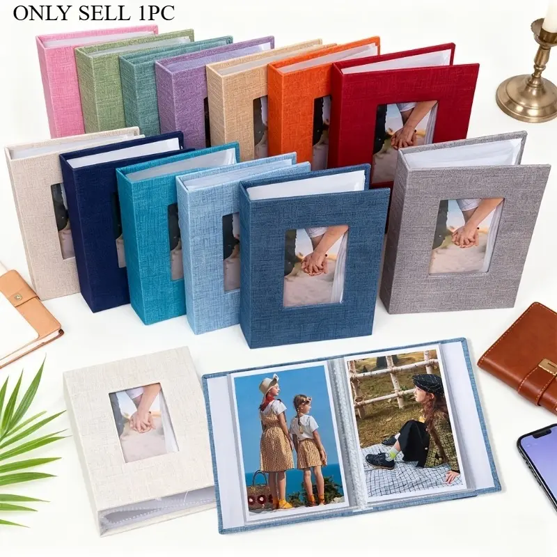 This new photo album features a fabric cover and holds 72 photos; made from durable plastic, it is perfect for documenting your baby's growth, holidays, and travel journals.