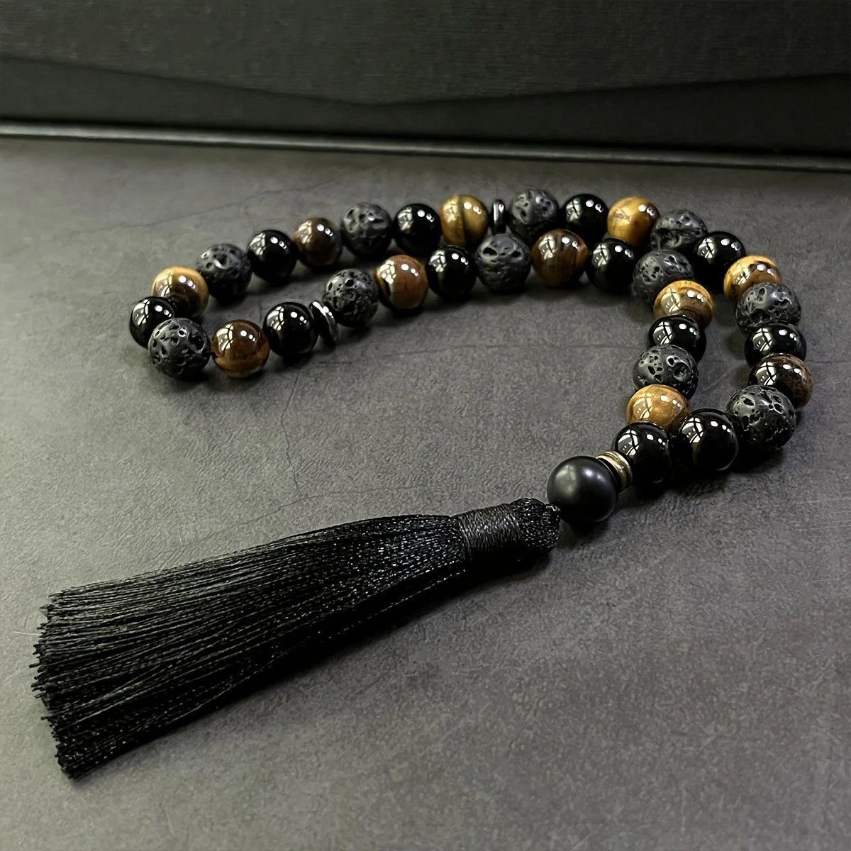 Handcrafted Bracelet Featuring 33 Beads Made of 10Mm Black Agate And Tiger'S Eye, Designed for Islamic Prayer And Pilgrimage. This Natural Stone Misbahah Serves As a Beautiful Accessory for Both Men And Women