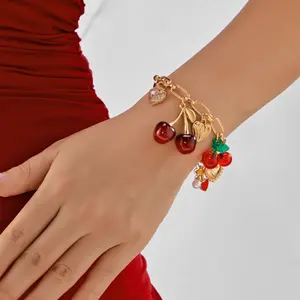 Trendy Cherry Multi-Charm Bracelet, Gold Tone Chain with Cherry, Heart, Pearl & Bow Details, Fashion Jewelry for Daily Wear