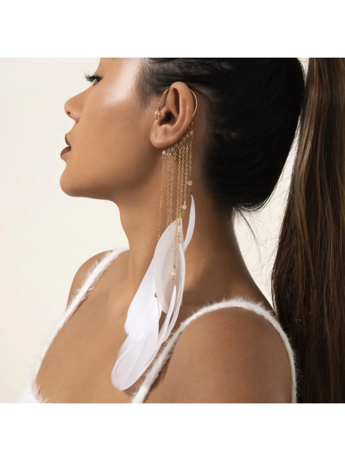 A package of European and American earrings, extremely fairy-like, exaggerated bohemian feather tassel long ear hangers for women