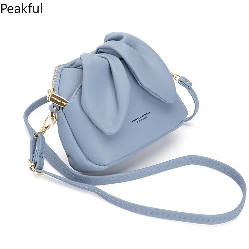 Wholesale trendy gift mini handbags  | Hard-to-find 2026 new kawaii gift shoulder accessory | Popular influencer-style rabbit ear mini bucket bag with solid stitching and adorable outline, great boutique bulk stocking