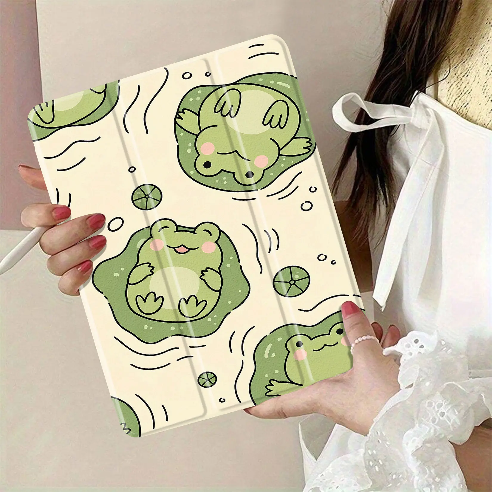 cute frog pattern fabric with vibrant green frogs and lily pads ideal for crafting sewing projects and home decor adds playful touch to children's rooms and gifts