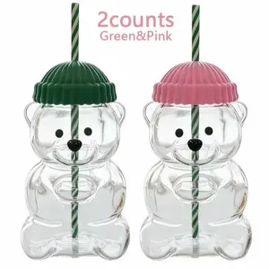 Adorable Teddy Bear Glass Straw Cup Seasonal Drinkware Coffee & Beverage Cup with Green & Pink Lids High Borosilicate Glass Tumbler for 2026 Holiday Collection Mug Shaped Tumblers Bottles ice  coffee  glass