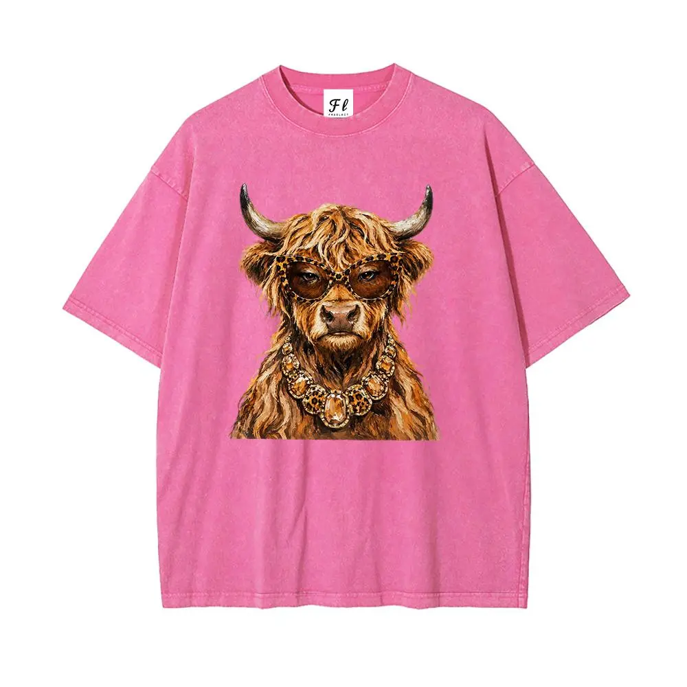A loose-fitting, vintage-wash T-shirt blending Western "Old Money" aesthetics with Y2K street style; it features a graphic of a fluffy Highland cow wearing leopard-print sunglasses and a gemstone necklace.