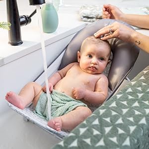 Foldaway 2-Position Baby Bath Seat, Adjustable Support for Sink or Bathtub, Ages 0-6 Months up to 20 Pounds, Machine-Washable Sling Foldaway 2-Position Baby Bath Seat, Adjustable Support for Sink or Bathtub, Ages 0-6 Months up to 20 Pounds, Machine-Washable Sling