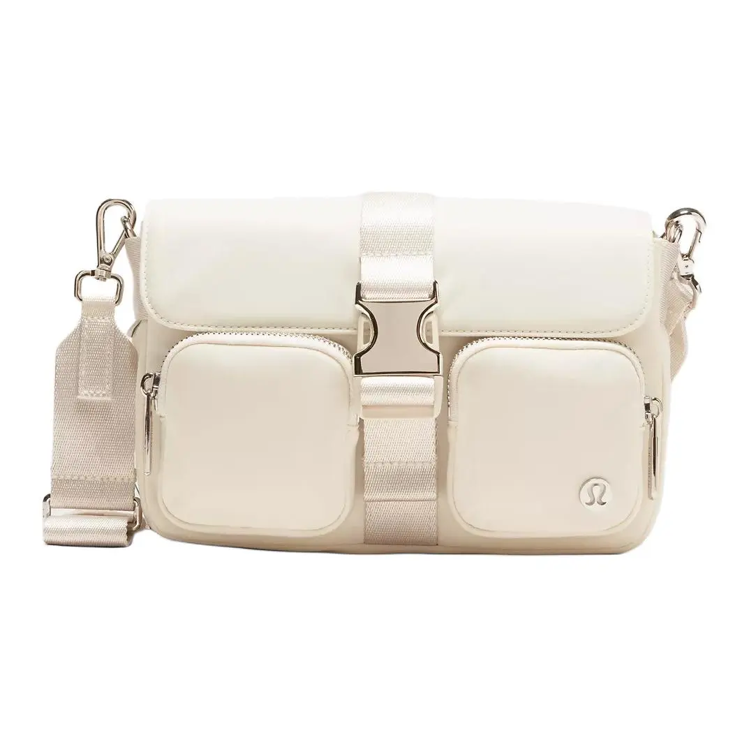 Lululemon Wunderlust 3L Crossbody Bag for Women – Adjustable Strap, Multi-Pocket Nylon Sling Bag in Light Ivory