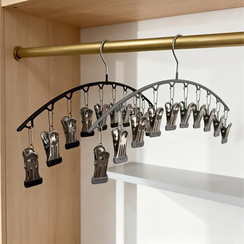 A Set of Two Metal Pant Hangers with a Curved Design Featuring 10 Clips, Offering Strong Grip And. They Can Hold Up to 10 Garments, Serving As Both Storage And Drying Solutions, Drying Racks