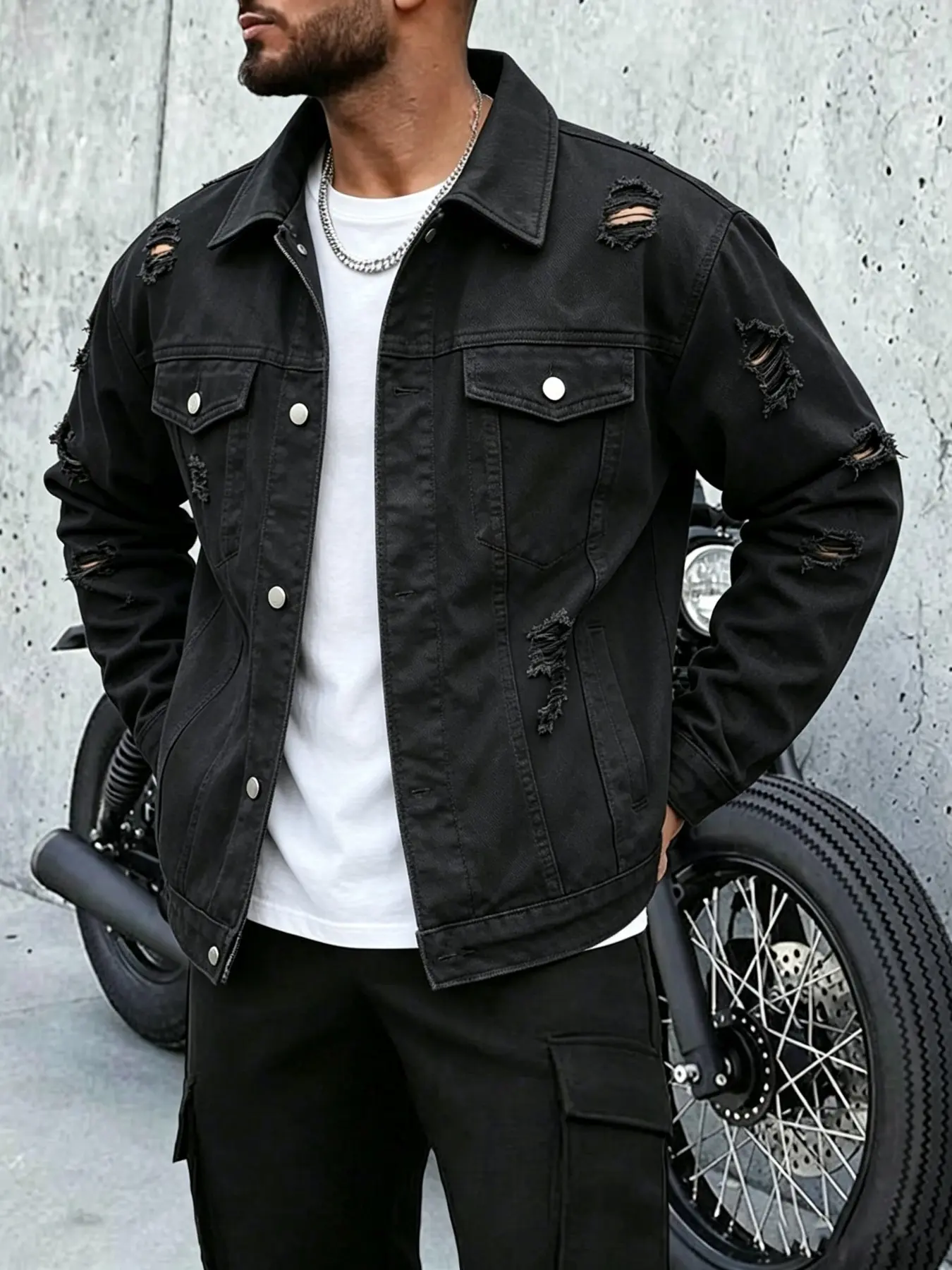 Men's denim jacket featuring a distressed, washed, and vintage finish; distinctive street style; lightweight design suitable for transitional weather; high-quality denim fabric; versatile for everyday street wear.