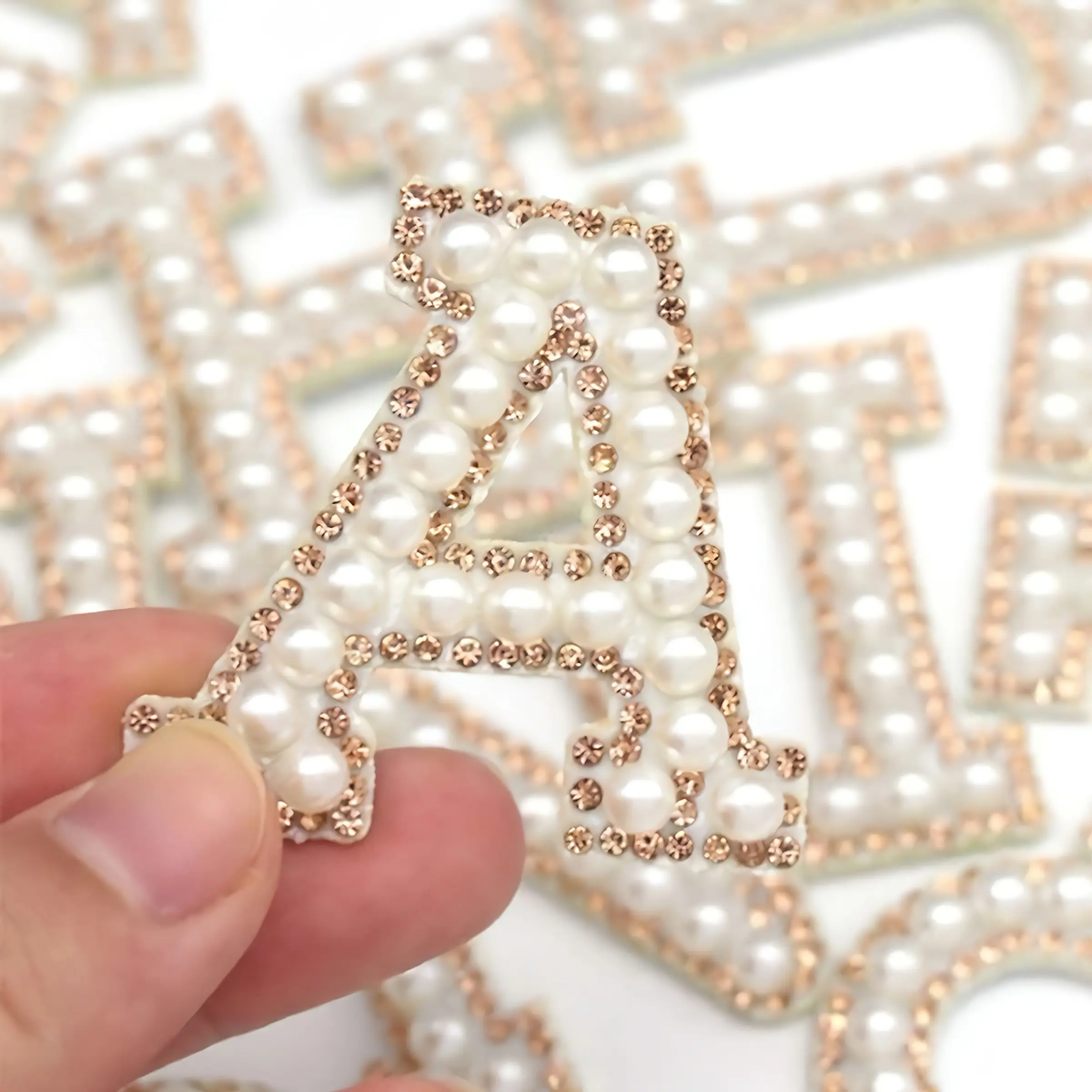 [Rhinestone Iron-on Letters] 52pcs Iron-on Letters with Rhinestones (A-Z) - Golden Rhinestones on White Background - for Garments, Fabrics and Backpacks