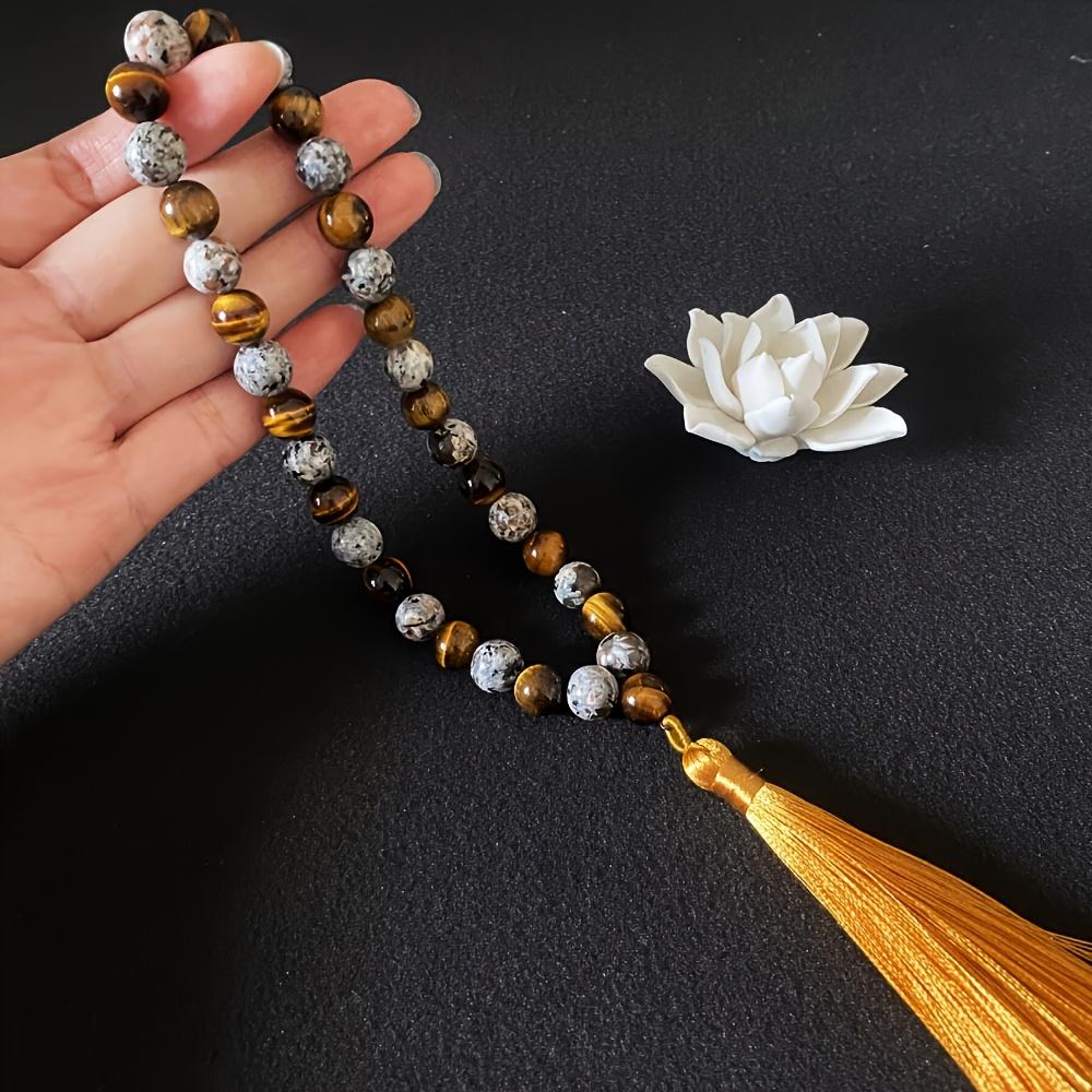 Handcrafted Bracelet Featuring 33 Beads Made of 10Mm Black Agate And Tiger'S Eye, Designed for Islamic Prayer And Pilgrimage. This Natural Stone Misbahah Serves As a Beautiful Accessory for Both Men And Women