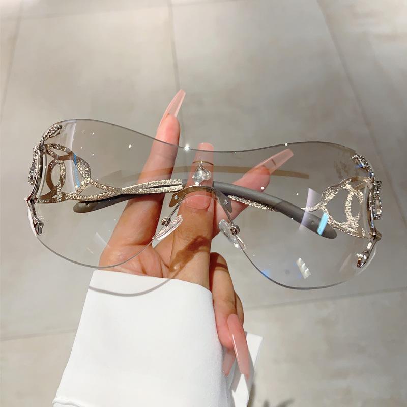 Y2K Rimless Luxury Brand Designer Sunglasses Women For Men One Piece Trendy Oversized Sun Glasses Metal Snake Pink Punk Shades durable