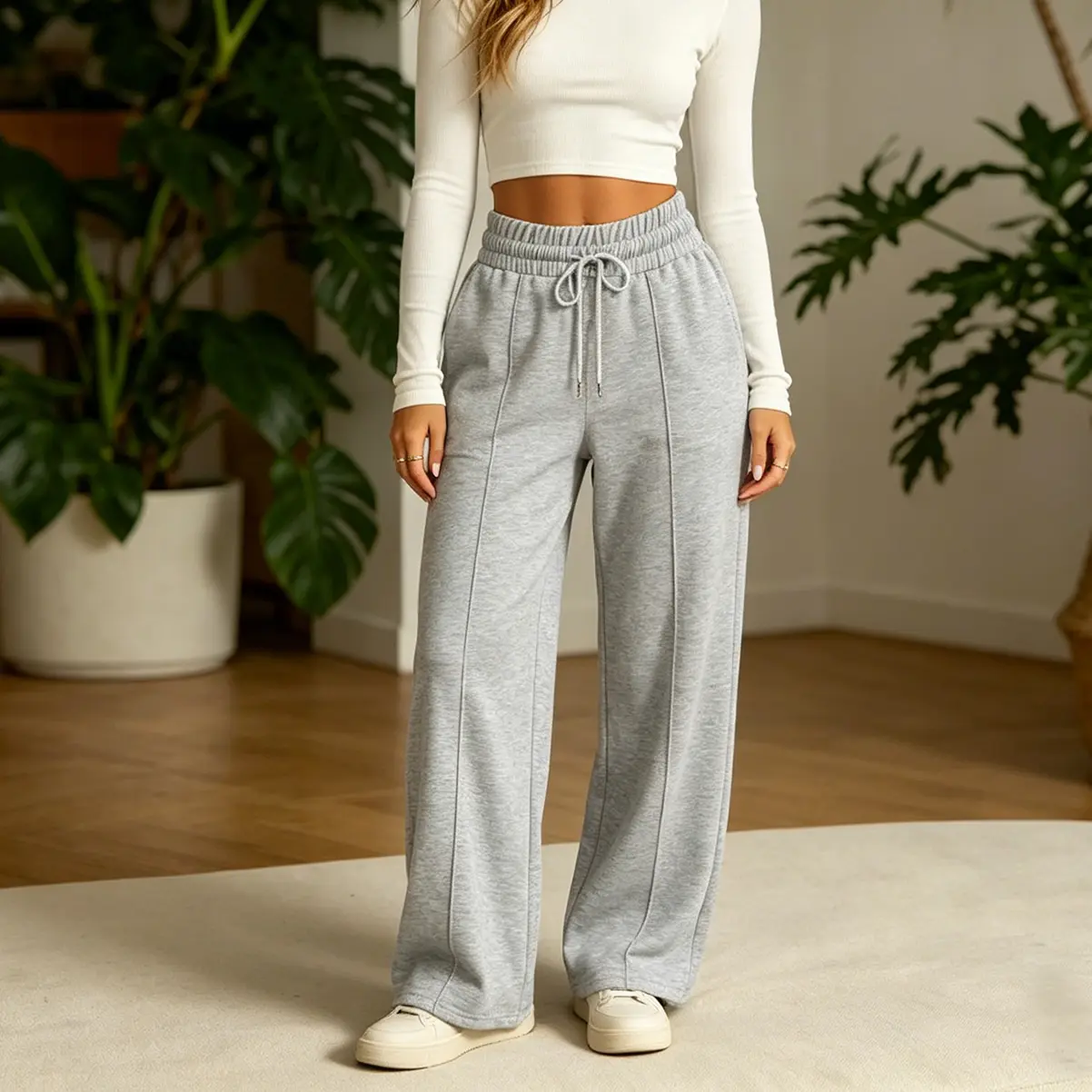 Straight-leg wide-leg sweatpants with a flattering drape, featuring an elastic drawstring waist—versatile, slimming, and perfect for casual or athletic wear.