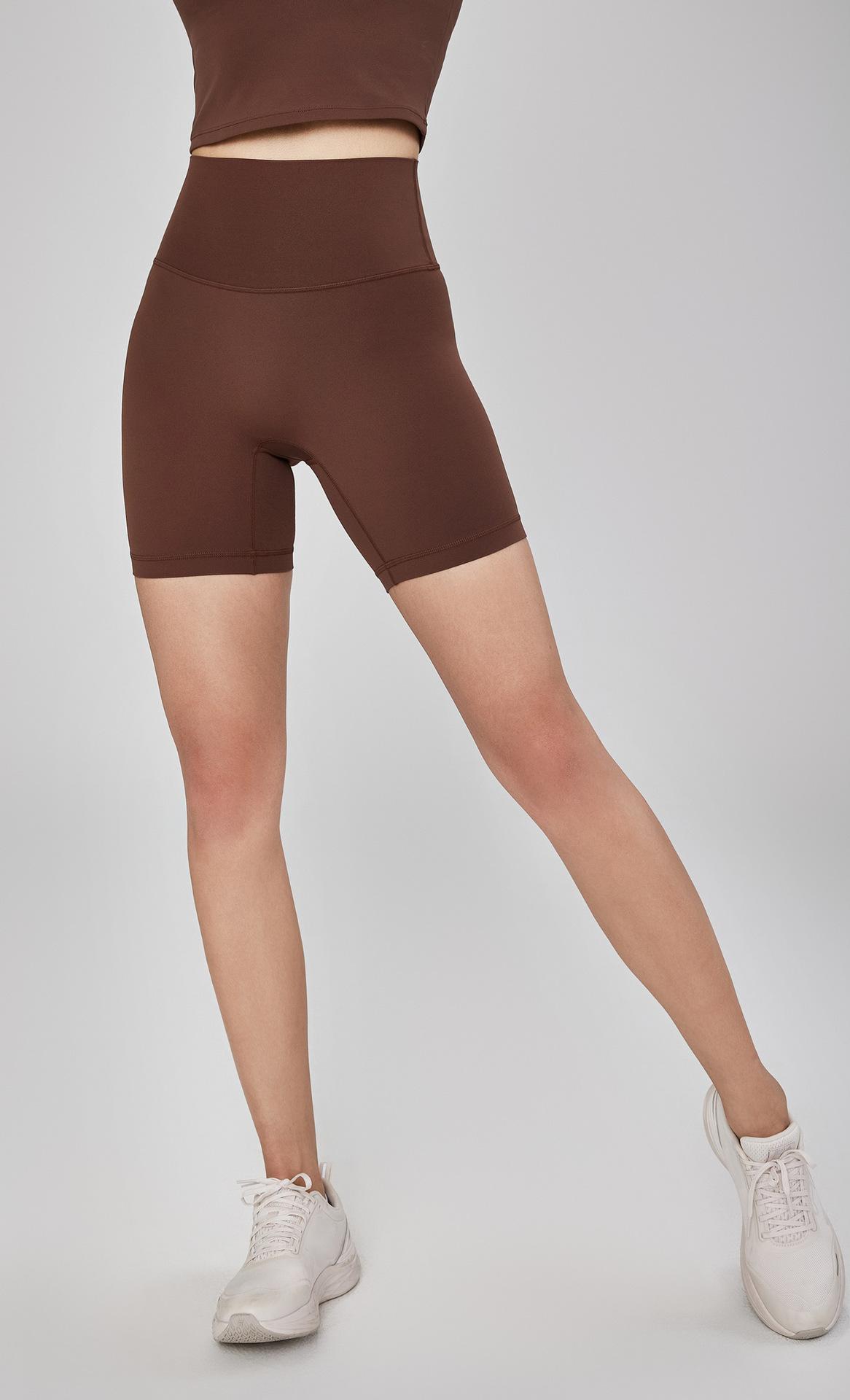 Spring and summer nude-feel running sports shorts for women, high-waisted, tummy-tightening, butt-lifting, three-quarter length pants for fitness, outdoor cycling, and yoga