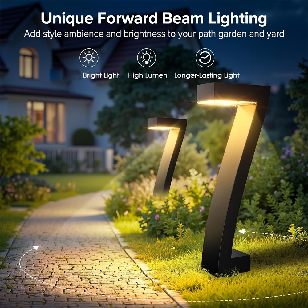 4-pack solar lights for outdoor walkways, upgraded bright LED outdoor solar lights, suitable for outdoor use, IP65 waterproof solar garden lights, suitable for courtyards, driveways, walkways, landscaping, and courtyard decoration.