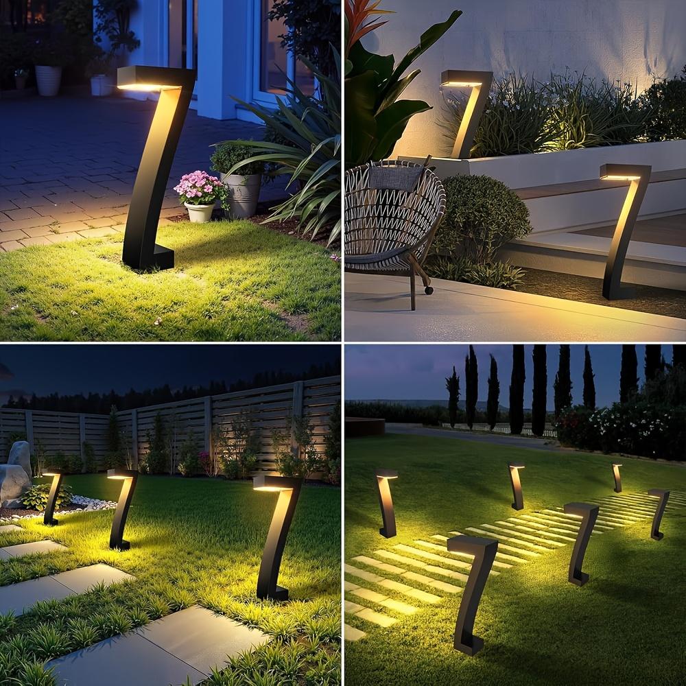 4-pack solar lights for outdoor walkways, upgraded bright LED outdoor solar lights, suitable for outdoor use, IP65 waterproof solar garden lights, suitable for courtyards, driveways, walkways, landscaping, and courtyard decoration.