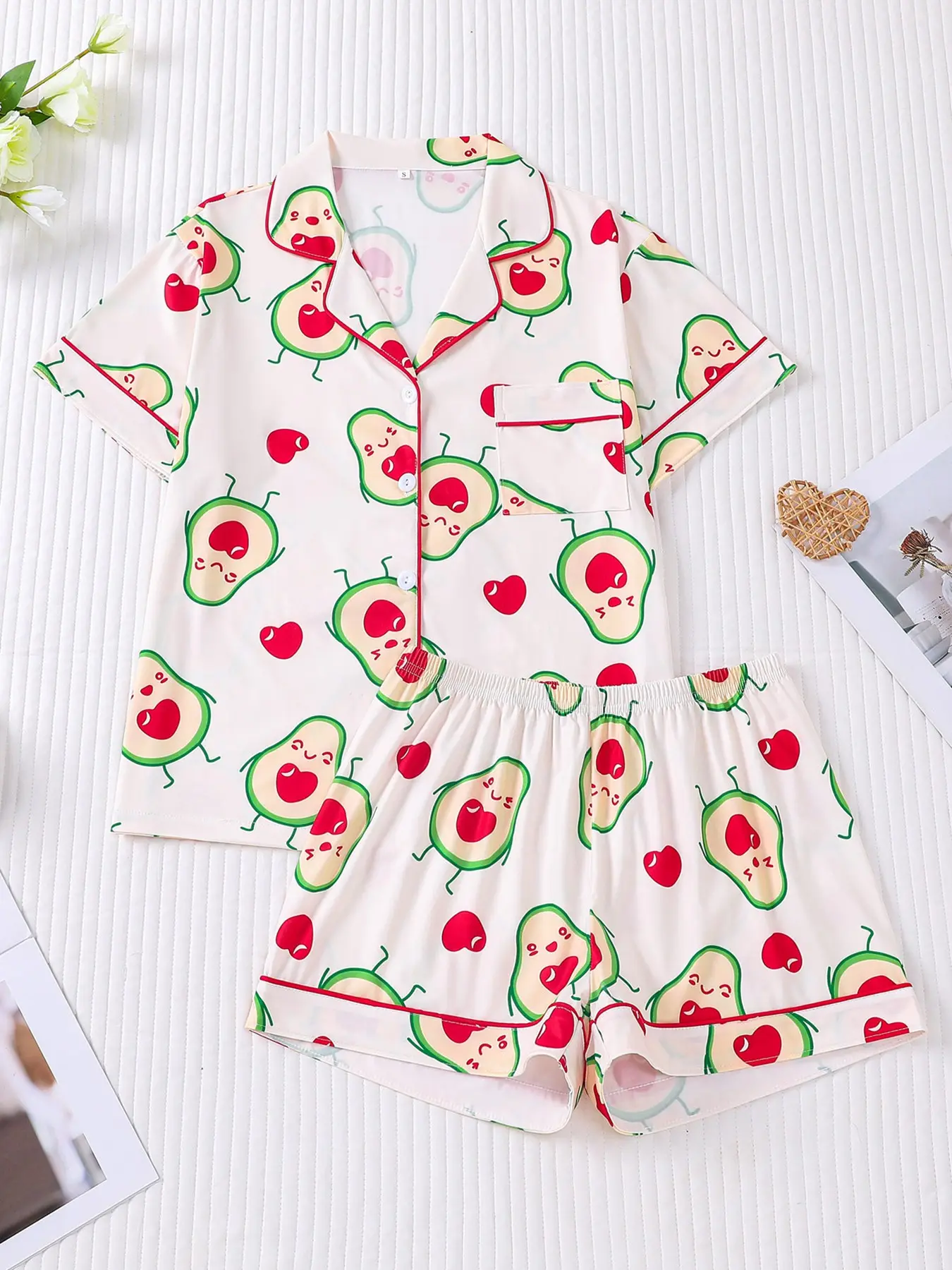 Women's 2-piece pajama set, Pjs, Nightwear, with cartoon avocado & heart prints on off-white base, red contrast piping, lapel short sleeve top with chest pocket, soft elastic waist shorts, fresh fruit-themed loungewear for women all-season daily home wear