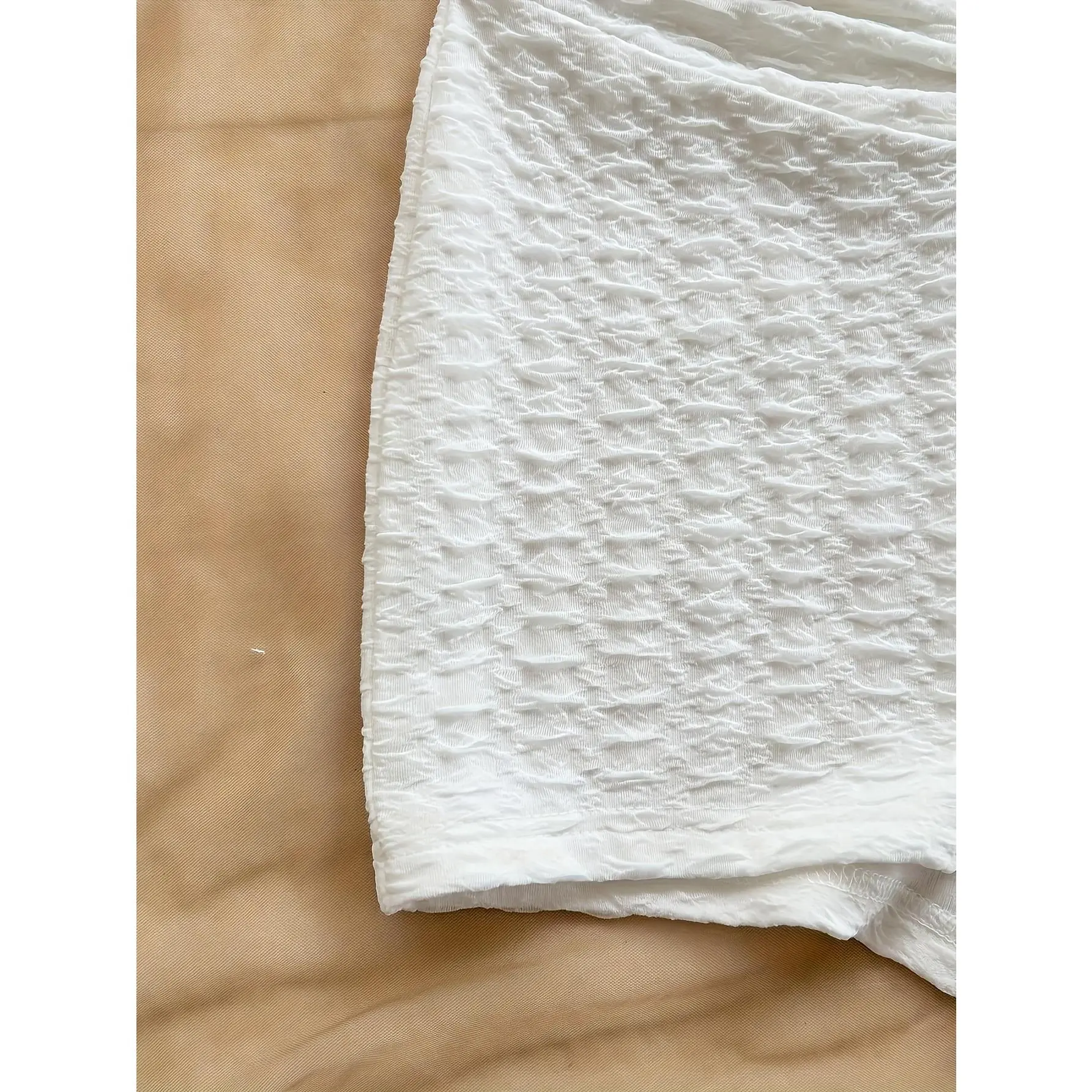 A Fitted White Textured Jumpsuit with a Metallic Finish for Women, Perfect for Parties, Dates, Afternoon Tea, Music Festivals, The Beach, Cruises, And Summer