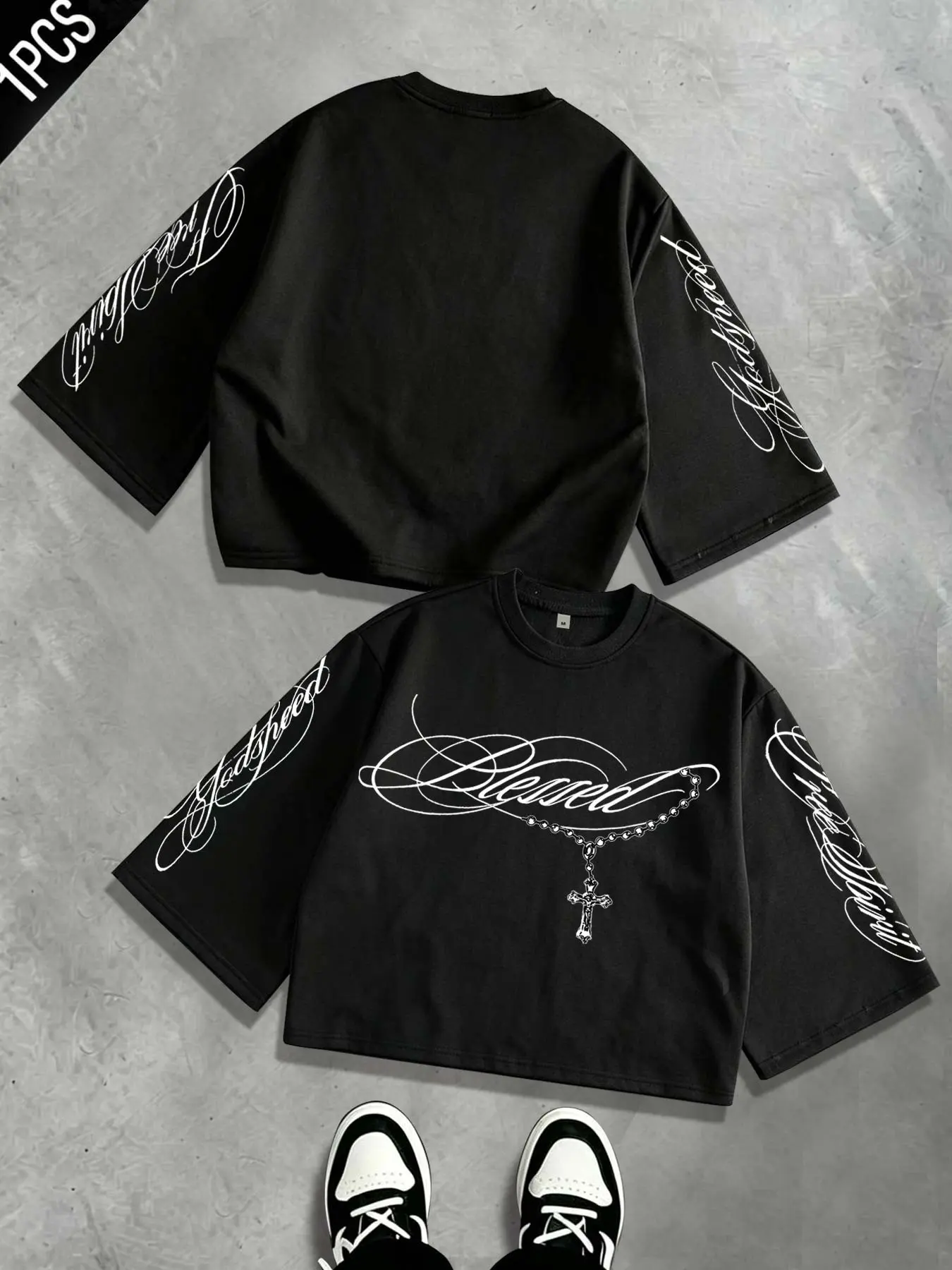 Men's cropped 3/4-sleeve T-shirt featuring a Gothic-style cross necklace graphic; women's loose, cropped 3/4-sleeve streetwear tee featuring vintage minimalist lines, Y2K-style dual-sleeve prints, and "Godspeed" / "Free Spirit" lettering.