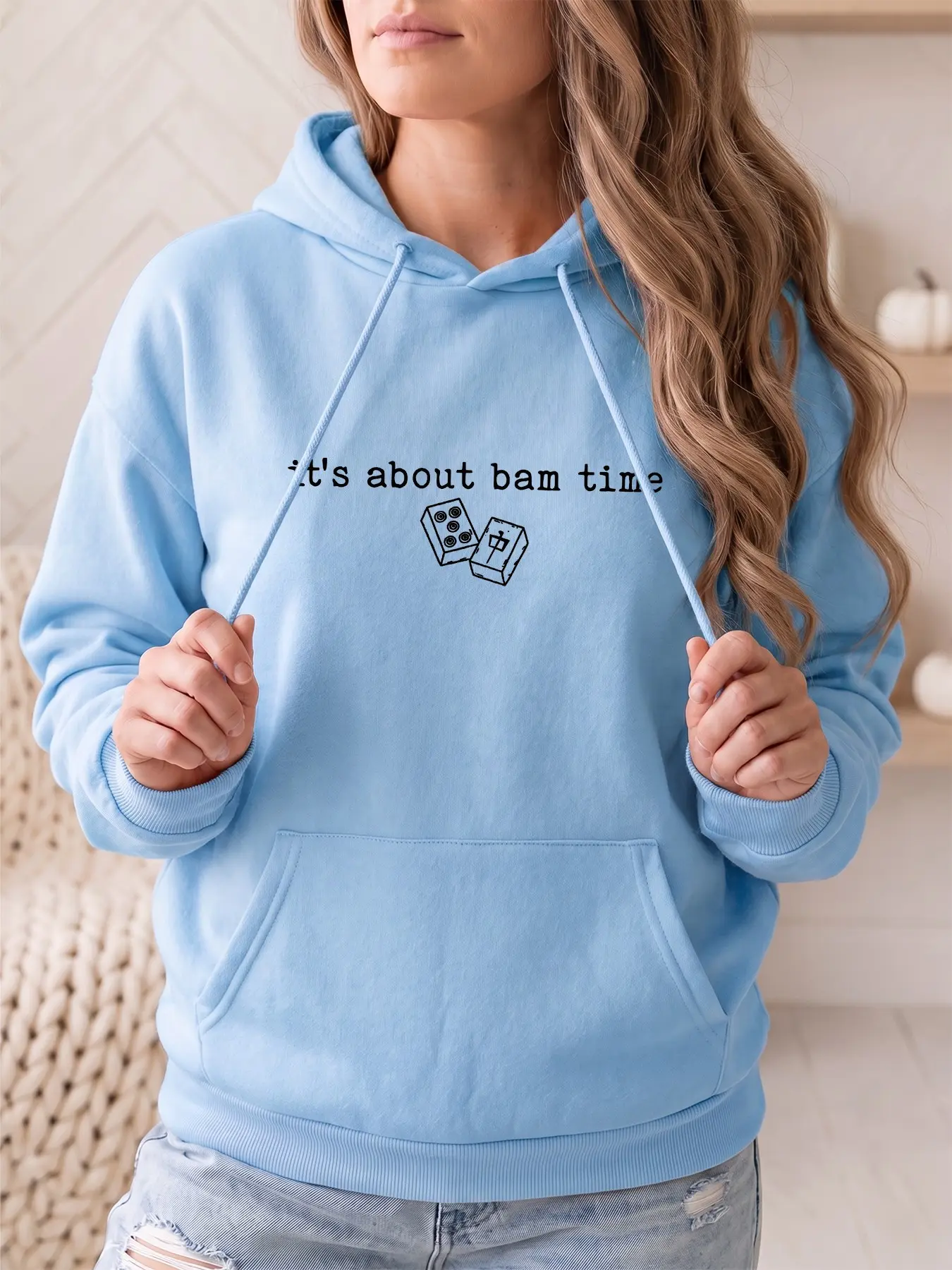 Women's fashionable hoodie with IT'S ABOUT BAM TIME letter and pattern print on the pocket, with a kangaroo pocket and long sleeves. This women's sportswear hoodie is suitable for autumn and winter seasons, and is perfect for daily casual outings and part