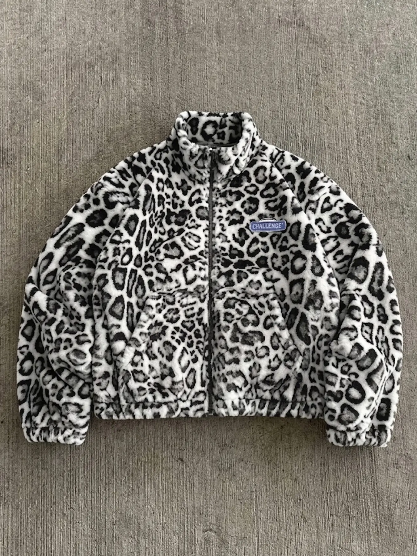 Unisex leopard-print fleece zip-up jacket—a warm, Casual streetwear-style piece perfect for everyday wear.