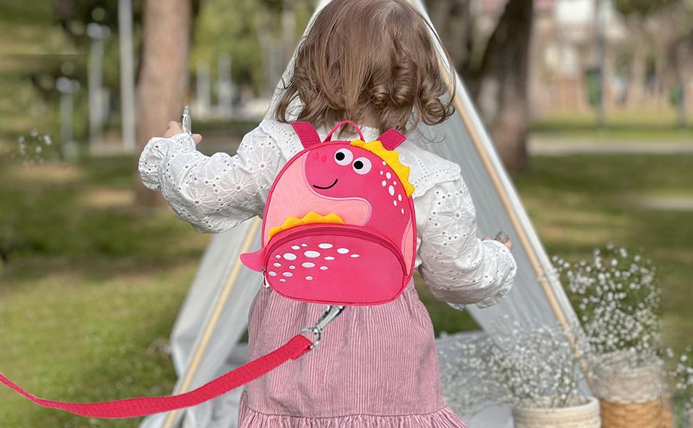 BY-XY Toddler Backpack Harness with Safety Leash, Cute Dinosaur Harnesses with Kids Anti Lost Wrist Link, Mini Child Schoolbag with Wristband Tether Strap and Protection Leashes for Baby Girls (Pink)