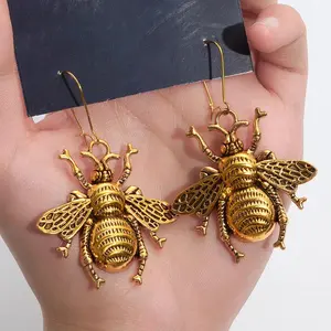 Fashionable and personalized golden bee earrings, surprising and unique insect earrings