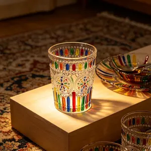 Hand-painted embossed glass tumblers with rainbow sunflower designs, retro boho-style aesthetically pleasing drinking glasses that cast rainbow refractions. Ideal for homemade juice, milk and whiskey, perfect for kitchen decor and gifting purposes