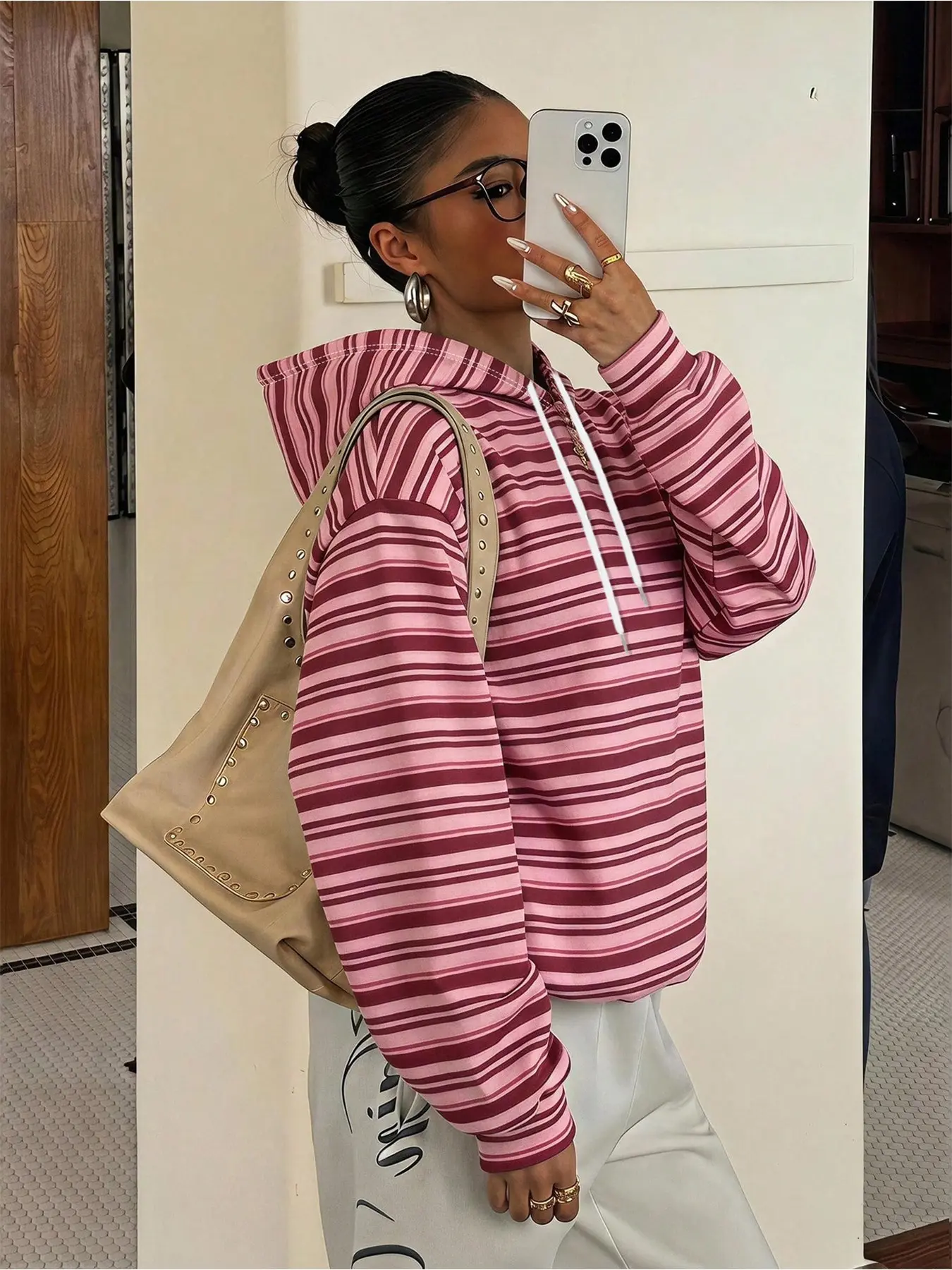 Women's fuchsia striped hoodie with drawstring design, suitable for casual, minimalist daily wear in autumn and winter, versatile for commuting, going out, or staying at home #stripedhoodie #hoodies