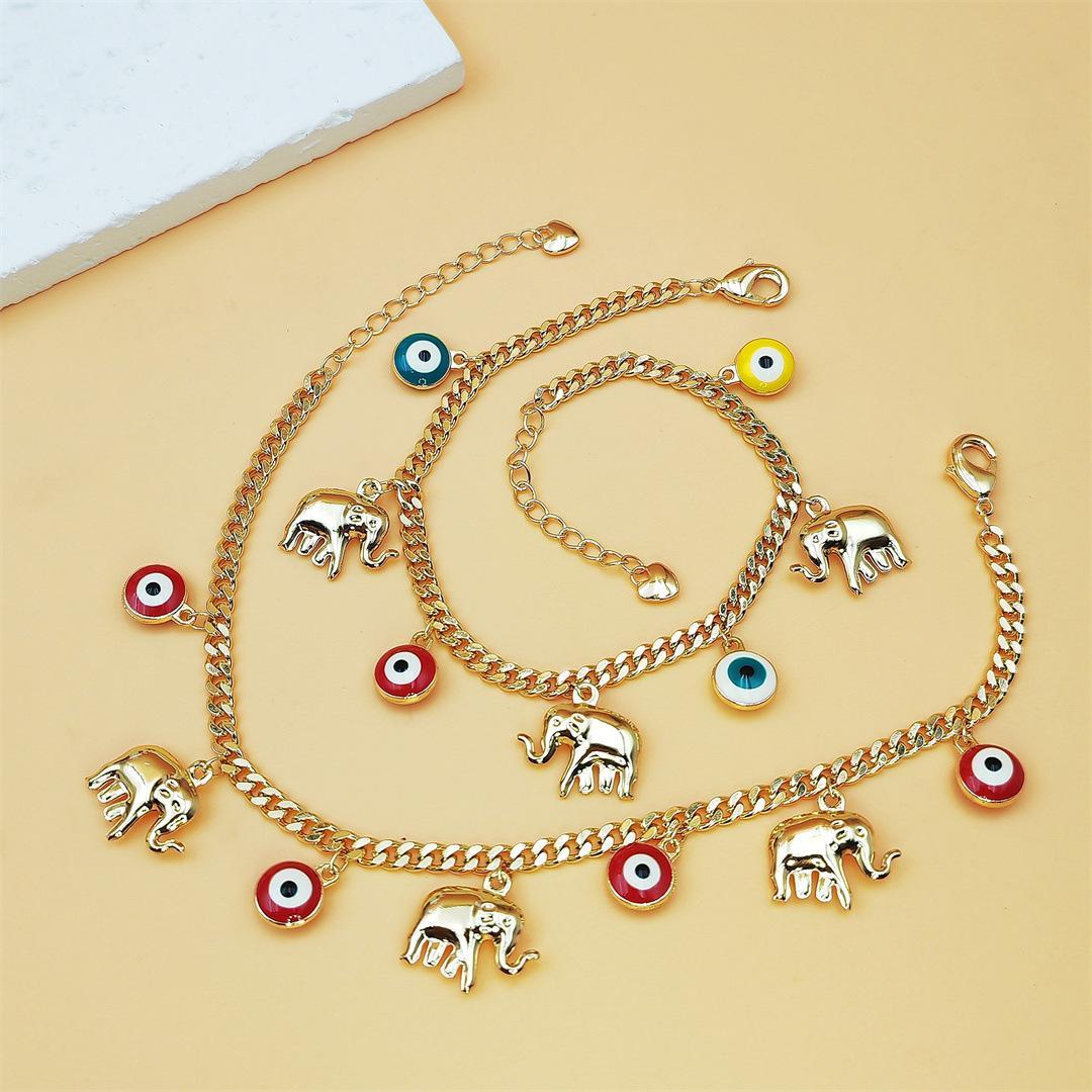 Gold Devil's Eye Lucky Elephant AnkletY2K Aesthetic Red Evil Eye Pendant Anklet Adjustable Gold Plated Chain Anklet for Party Birthday Holiday Gift Daily Wearwith Baby Elephant Pendant Adjustable Length for Stylish Accessory