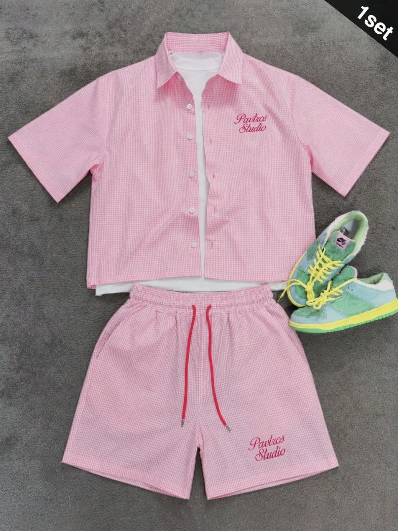 Men's Stylish Casual Pink Plaid Two-Piece Set: An Embroidered Letter Short-Sleeved Shirt and Drawstring Elastic Waist Shorts. A Fashionable Preppy Outfit, Perfect for Summer Everyday Wear and Street Style.