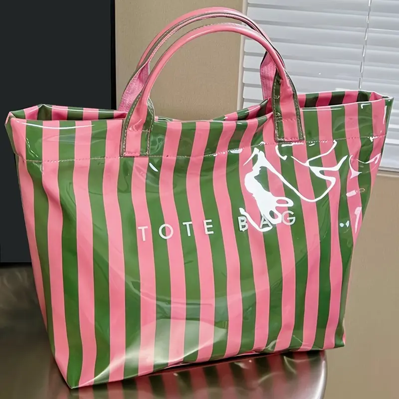 Stripe color-block waterproof PVC handbag with glossy finish. Roomy space for makeup and toiletries, versatile for outdoor travel and students’ daily wash storage. Cosmetic Toiletry Bag