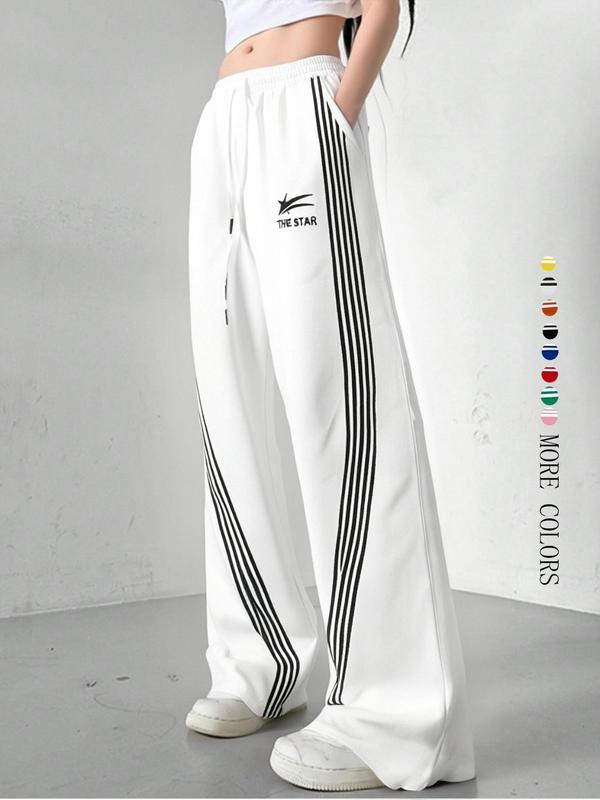 Women's Wide-Leg Track Pants, elastic drawstring waist with contrast side stripes and "THE STAR" logo print, relaxed fit for streetwear, dance and casual daily wear, available in multiple colors
