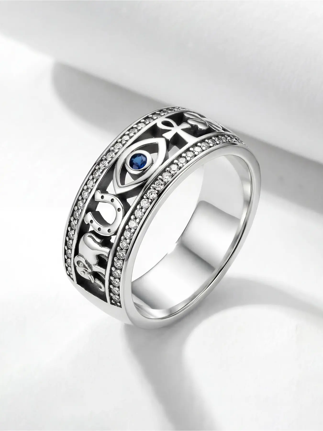 Silver-Plated Lucky Symbol Band Amulet Jewelry Ring with Blue Zircon Evil Eye and Clear Zircon Edges, Featuring Elephant, Horseshoe and Ankh Motifs